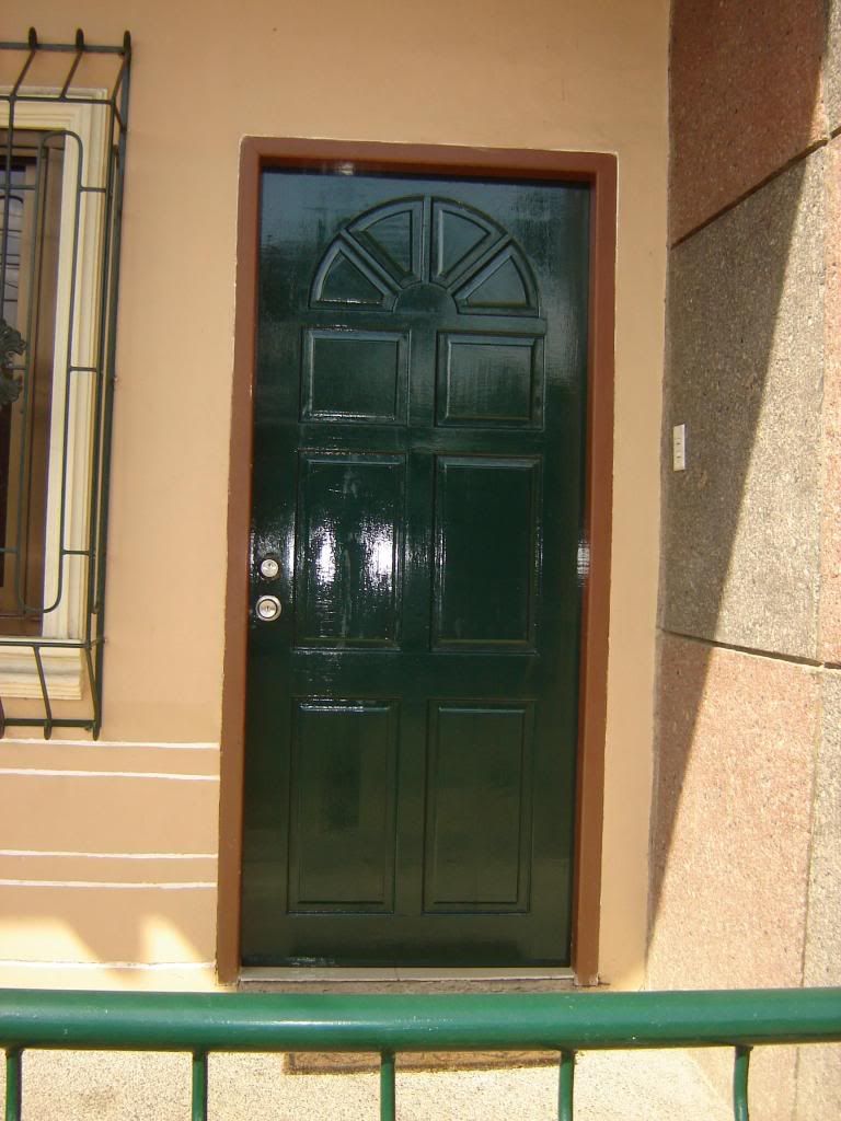 front door, front door painted green, still with the old brown frame then